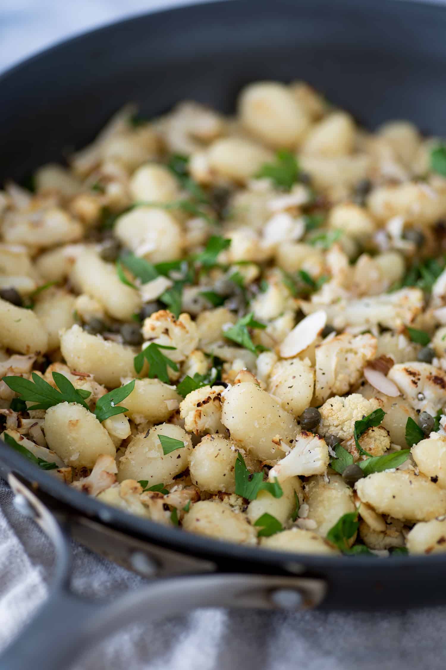 Vegan Gnocchi With Roasted Cauliflower And Lemon! This Dinner Is Perfect For Fall; Crispy Roasted Cauliflower, Capers, Garlic Breadcrumbs, Gnocchi And Fresh Lemon Juice. A Must-Make. | Www.delishknowledge.com 