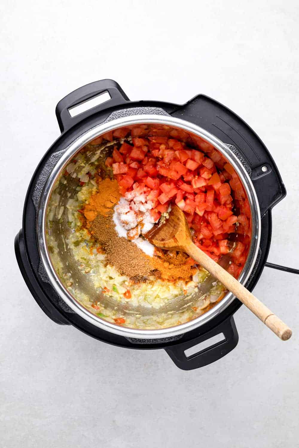 tomatoes and spices in the instant pot