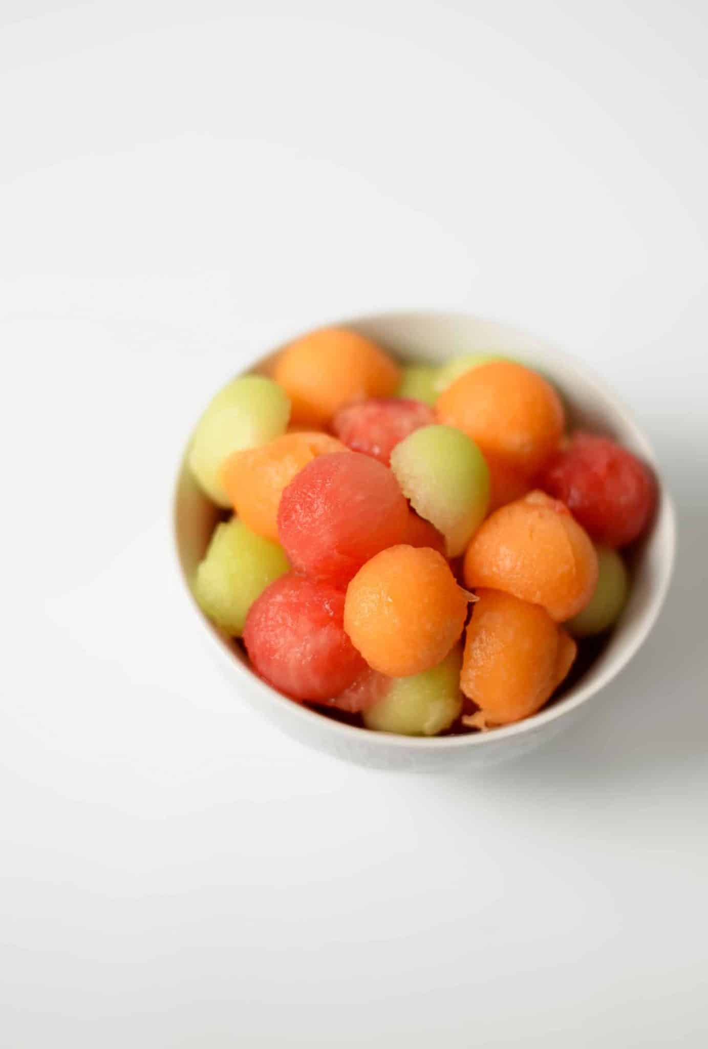 Melon Ball Skewers with BasilMint Dressing Delish Knowledge