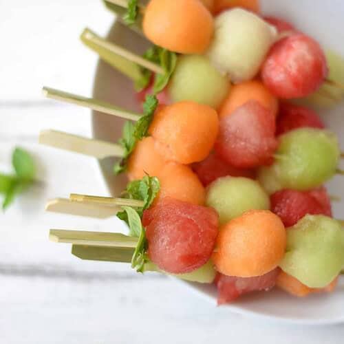 Melon Ball Skewers With Basil-Mint Dressing. A Refreshing Snack Or Dessert For Summer! Vegan And Gluten-Free | Www.delishknowledge.com