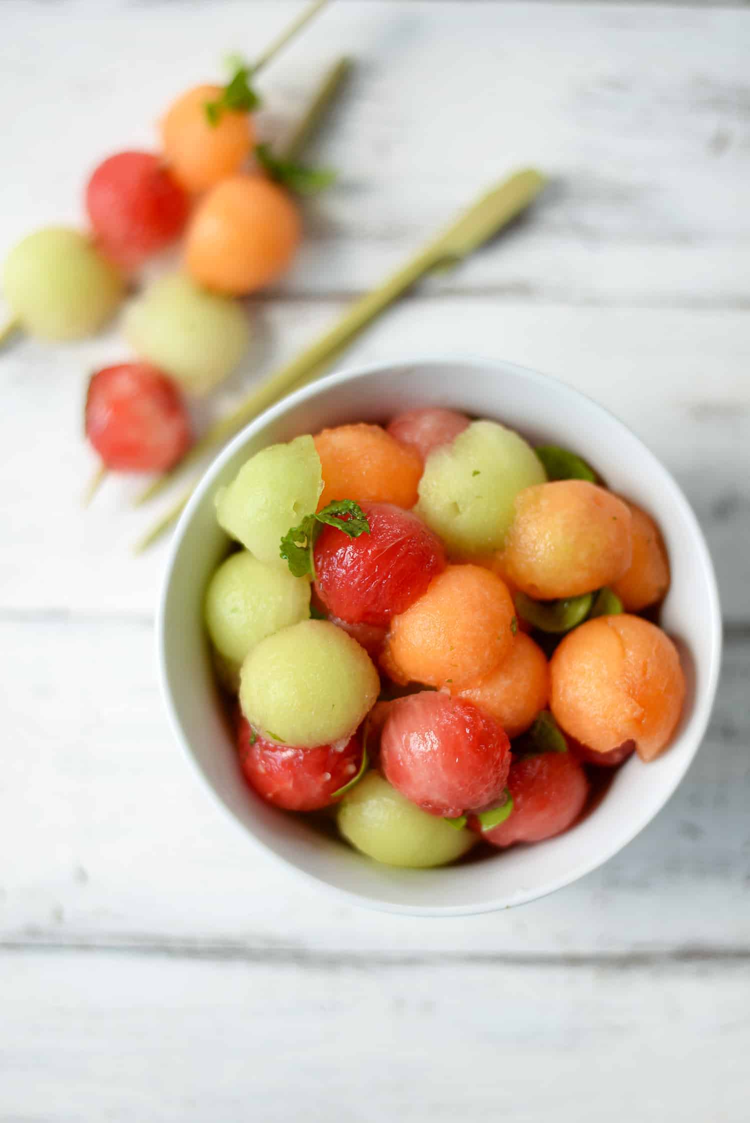 Melon Ball Skewers With Basil-Mint Dressing. A Refreshing Snack Or Dessert For Summer! Vegan And Gluten-Free | Www.delishknowledge.com