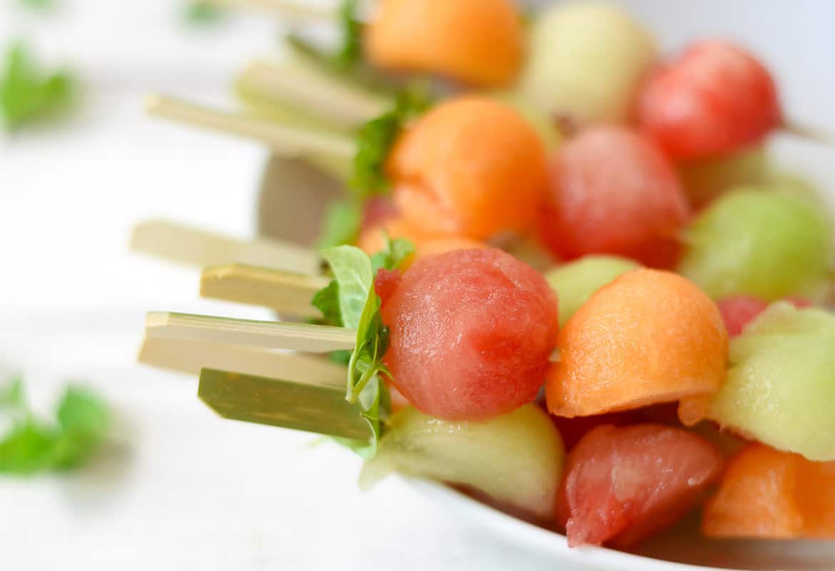 Melon Ball Skewers with BasilMint Dressing Delish Knowledge