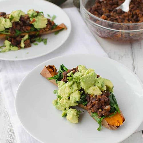 Mexican Stuffed Sweet Potatoes 6 Mexican Stuffed Sweet Potatoes! Baked Potatoes Stuffed With Spinach, Spicy Black Beans, Avocado And Cilantro. This Meal Is So Filling And Packed With Nutrition! Gluten Free And Vegan! | Www.delishknowledge.com