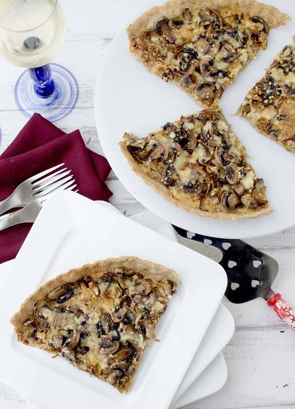 Caramelized onion and mushroom tart! The perfect vegetarian appetizer, side or main dish. Whole wheat tart stuffed with onions, mushrooms, and gorgonzola cheese. | www.delishknowledge.com
