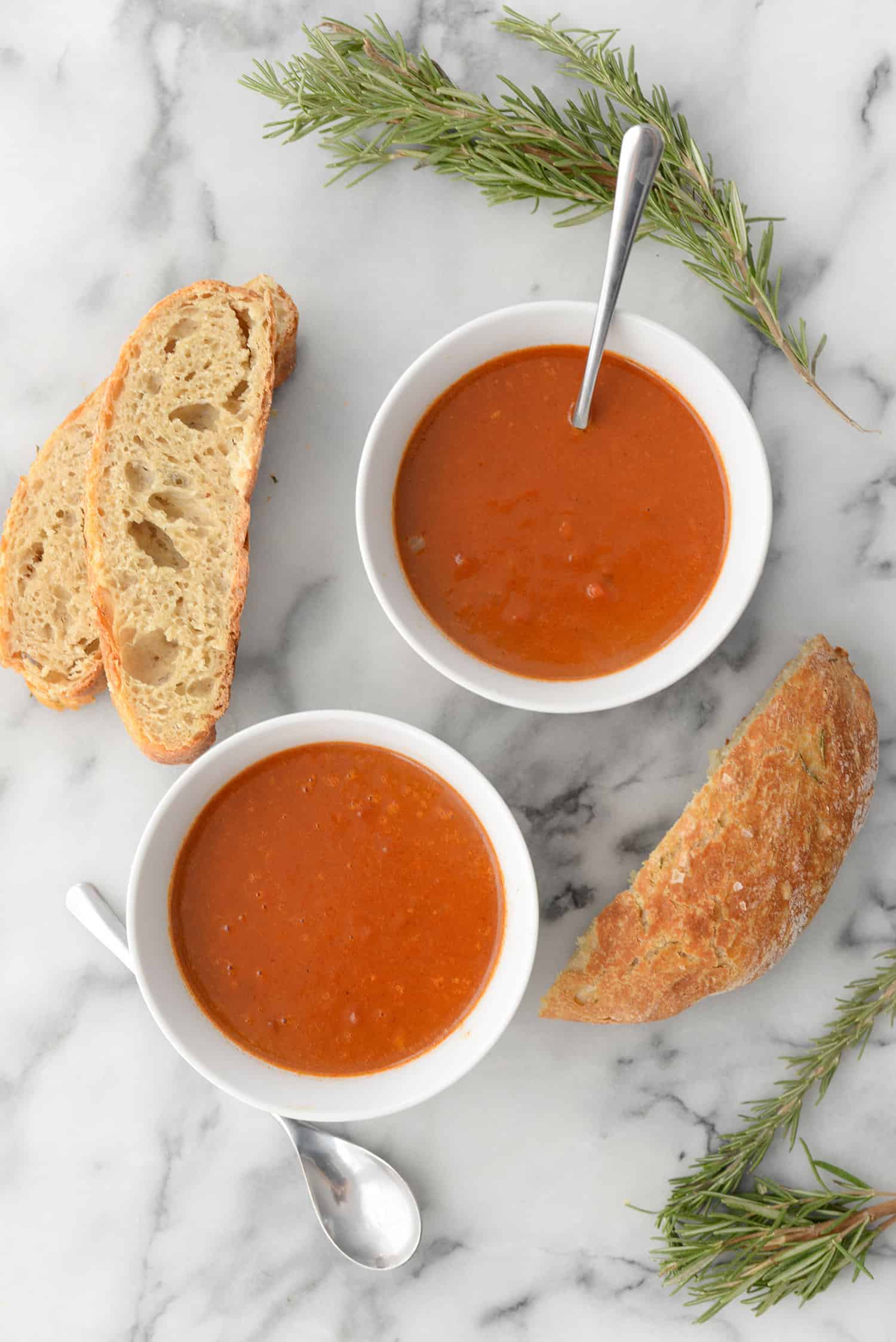 No Knead Whole Wheat Rosemary Bread Slices With Soup Bowls