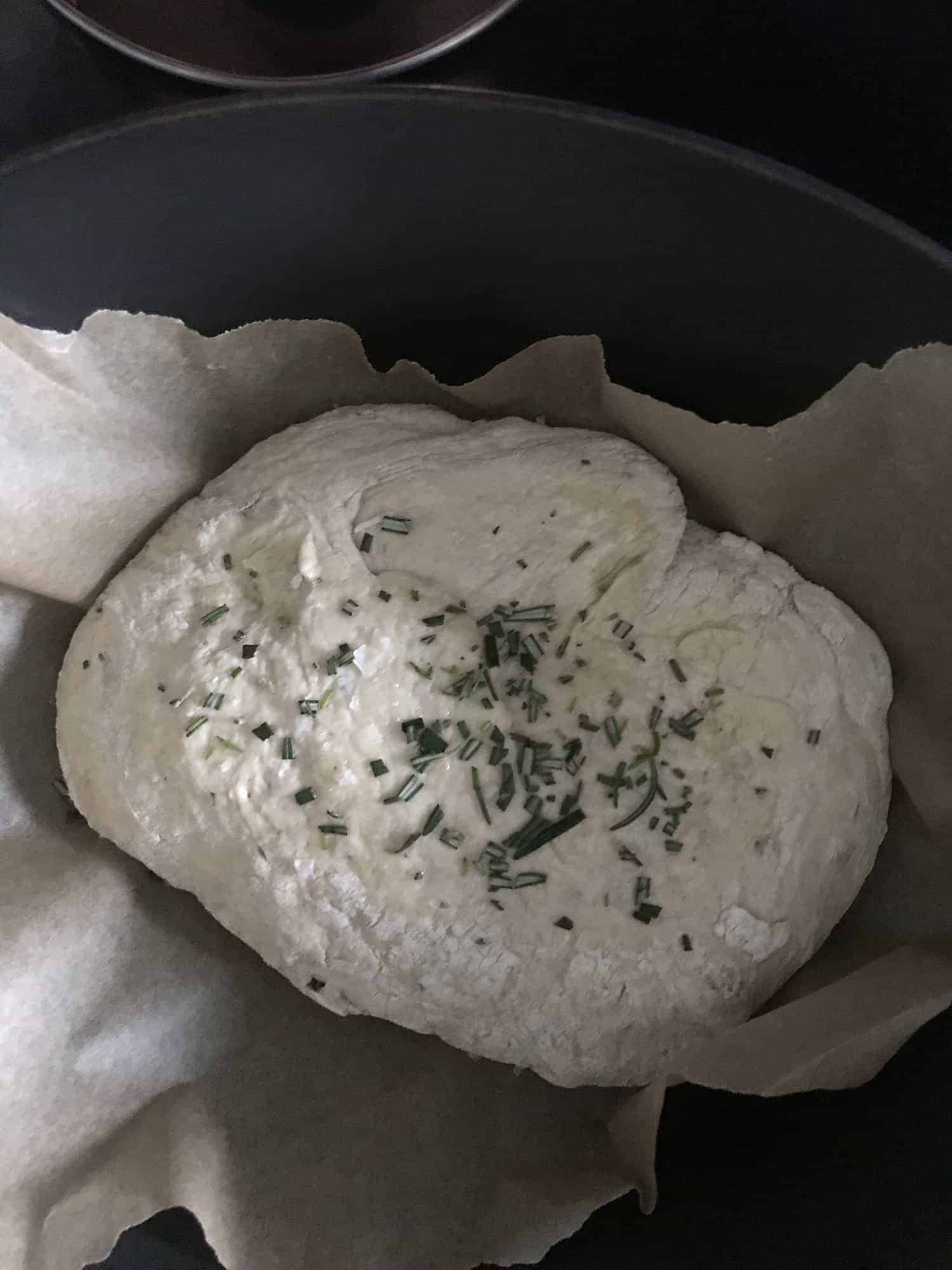 seasoning bread dough with rosemary and sea salt