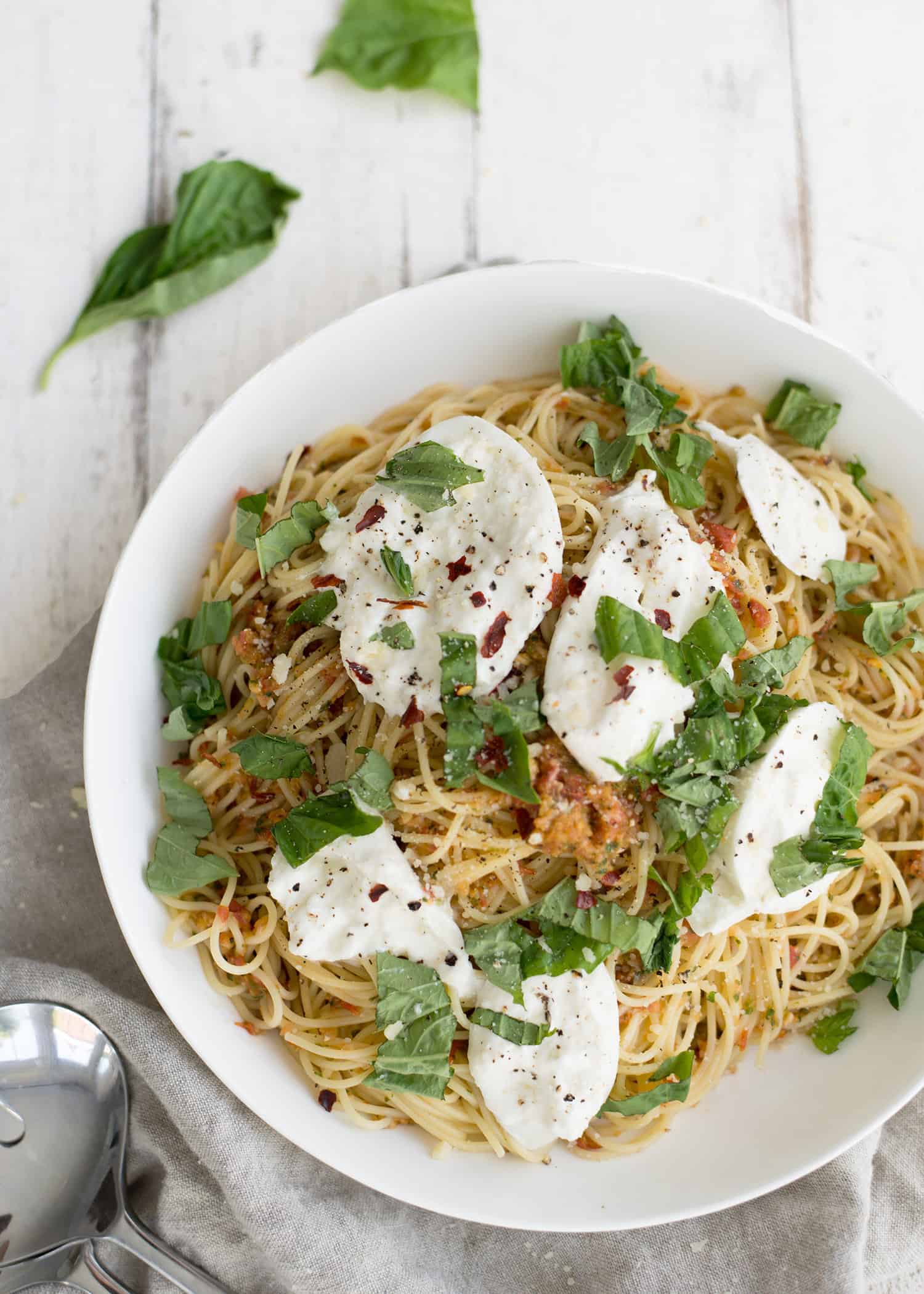 Pasta Checca With Burrata! This Recipe Is Ready In Less Than 20 Minutes. Quick, No-Cook Sauce Tossed With Hot Angelhair Pasta And Topped With Creamy Burrata. Vegetarian. | Www.delishknowledge.com