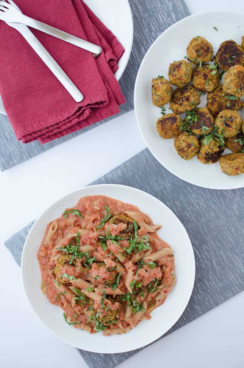 penne pasta with vegan vodka cream sauce in a white bowl 