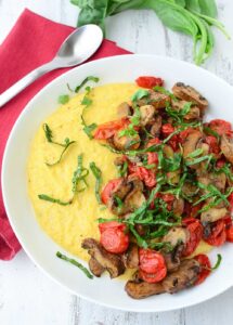 Weeknight Comfort Food! Cheesy Polenta Bowl Topped With Roasted Tomatoes And Mushrooms. Vegan And Gluten-Free. | Www.delishknowledge.com