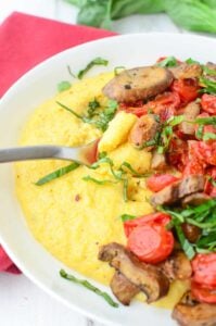 Weeknight Comfort Food! Cheesy Polenta Bowl Topped With Roasted Tomatoes And Mushrooms. Vegan And Gluten-Free. | Www.delishknowledge.com