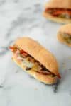 Portobello Cheesesteak Sandwiches! You've gotta try these vegetarian sandwiches. Caramelized onions, peppers and mushrooms in a toasted hoagie roll and provolone cheese. A must-make! | www.delishknowledge.com