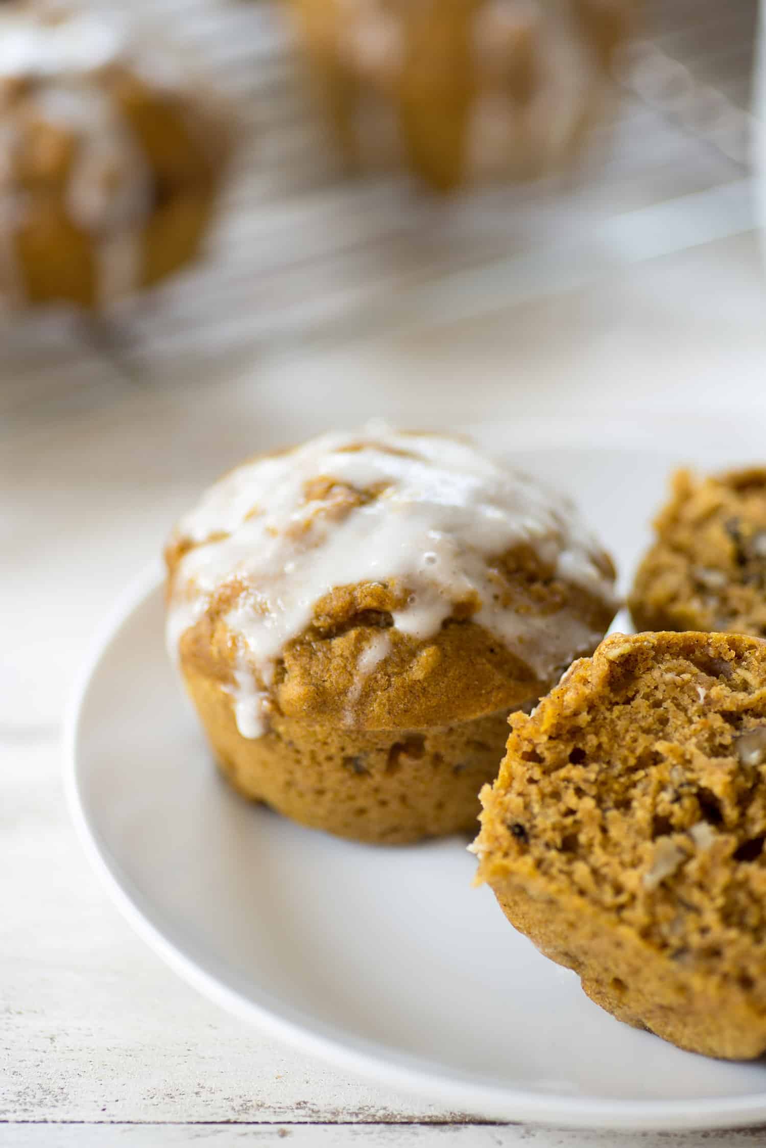 Pumpkin Muffins With Yogurt Glaze! These Healthy, Fiber-Rich Muffins Are Perfect For Fall. Topped With A Homemade Yogurt Glaze. So Delicious, Perfect For School Lunches And Afternoon Snacks! 