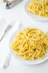 Vegan Pumpkin Fettuccini! Yes, alfredo sauce can be healthy! Made with a secret ingredient, this sauce is creamy, slightly sweet with a hint of nutmeg and sage. You have to try this! You will never go back to regular alfredo sauce again!