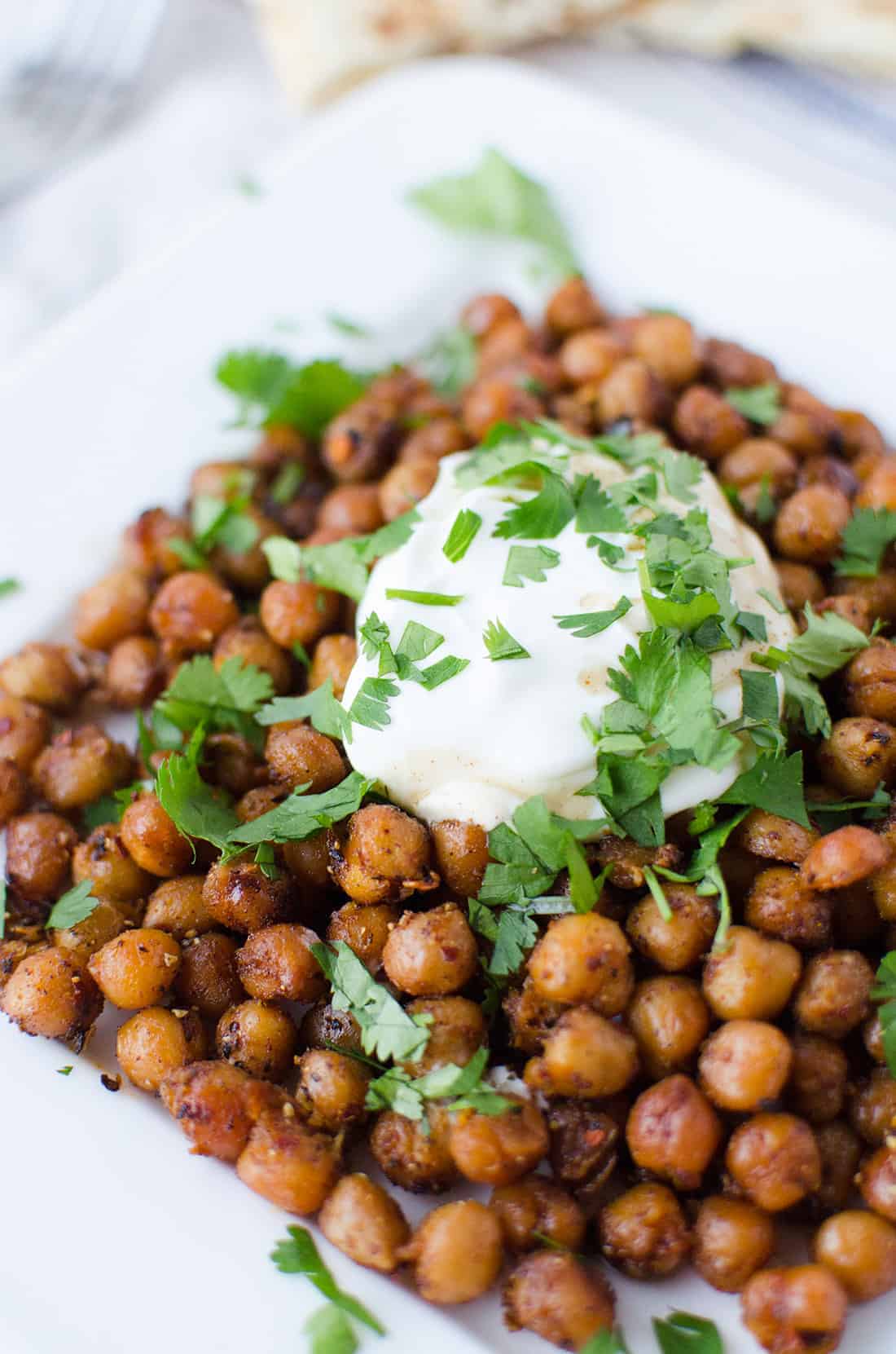 Dinner Is Ready In Just 15 Minutes! Roasted Indian Chickpeas With Tamarind Sauce, Yogurt And Cilantro. Healthy, High Protein And Easy! | Www.delishknowledge.com