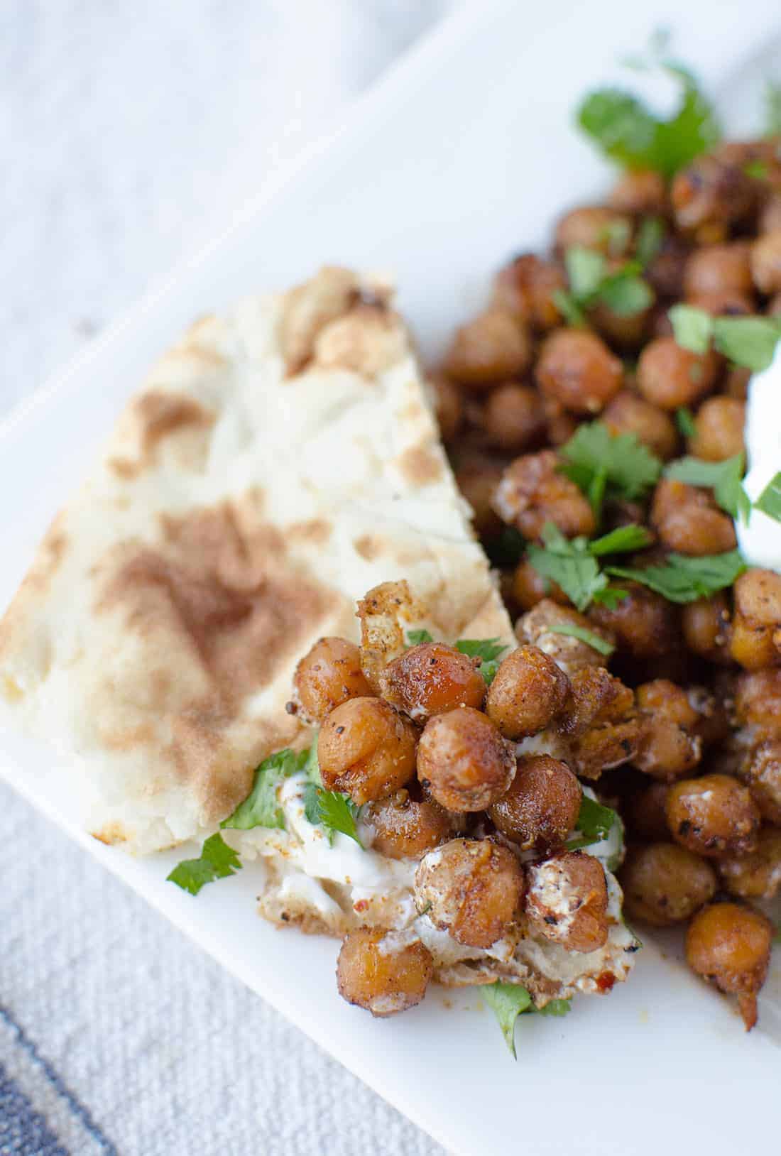 Dinner Is Ready In Just 15 Minutes! Roasted Indian Chickpeas With Tamarind Sauce, Yogurt And Cilantro. Healthy, High Protein And Easy! | Www.delishknowledge.com