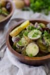 Red, White and Blue Potato Salad! Ready in just 15 minutes! Vegan and Gluten-Free. Little creamer potatoes tossed in a tangy herb dressing. Perfect for summer BBQs, Picnics and Cookouts! | www.delishknowledge.com