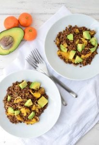 Who says lentils are boring!? Not these! A twist on traditional lentil salad! French lentils cooked in orange juice then topped with oranges, shallots and creamy avocado. #vegan and #lglutenfree | www.delishknowledge.com