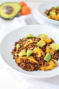 Who says lentils are boring!? Not these! A twist on traditional lentil salad! French lentils cooked in orange juice then topped with oranges, shallots and creamy avocado. #vegan and #lglutenfree | www.delishknowledge.com