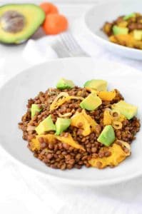 Who says lentils are boring!? Not these! A twist on traditional lentil salad! French lentils cooked in orange juice then topped with oranges, shallots and creamy avocado. #vegan and #lglutenfree | www.delishknowledge.com