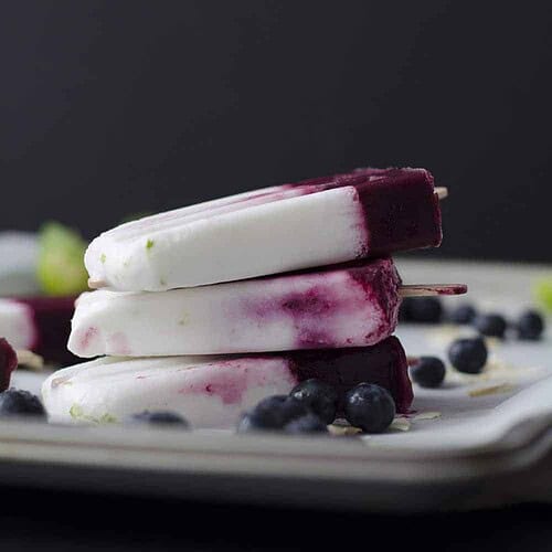 Roasted Blueberry, Coconut and Lime Popsicles 5 Roasted Blueberry, Coconut And Lime Popsicles! Roasting Intensifies The Sweetness Of The Berries, With Very Little Added Sugar. Layers Of Roasted Blueberries, Coconut And Lime. Vegan &Amp; Gluten-Free | Www.delishknowledge.com