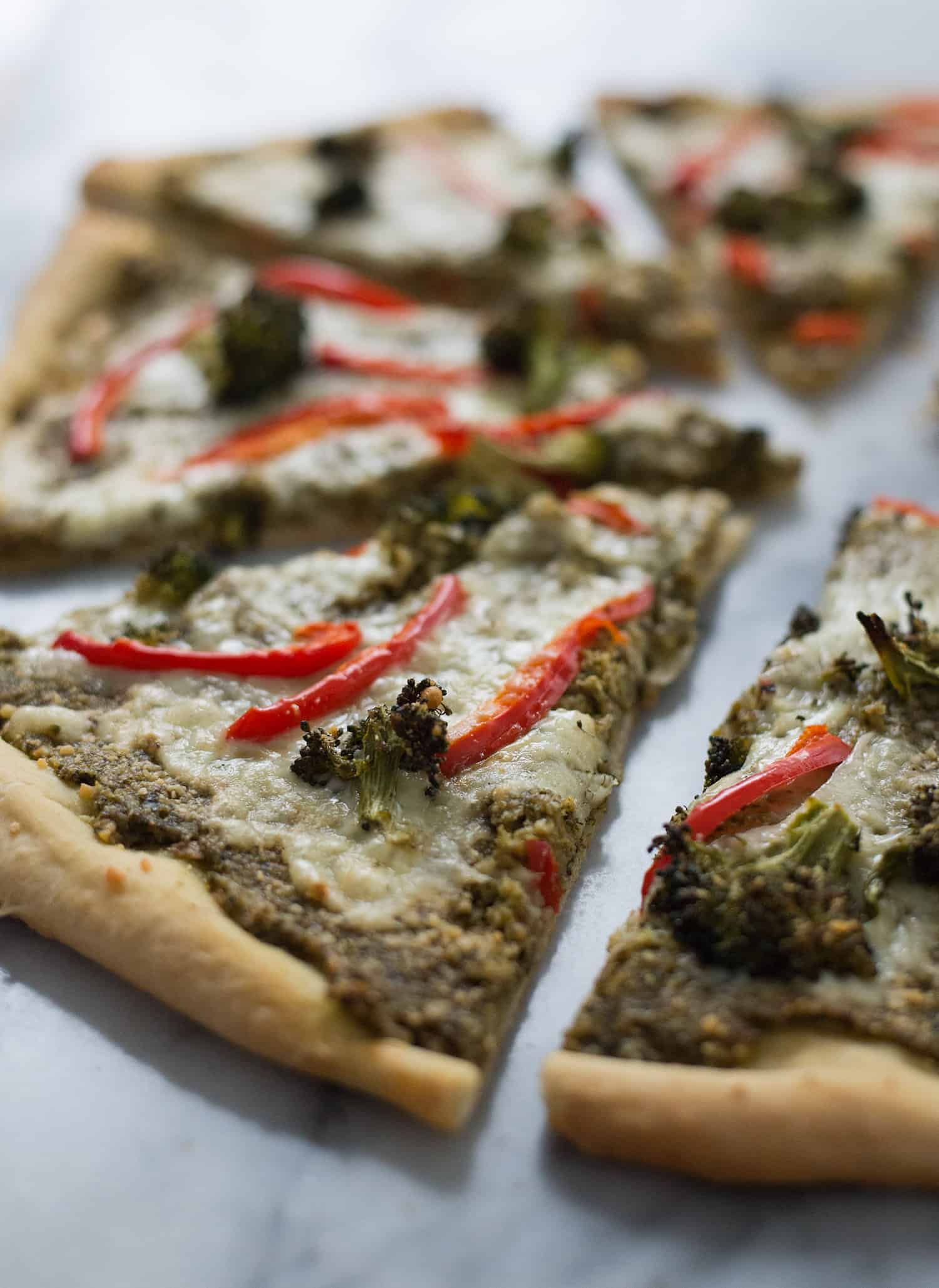 Roasted Broccoli Pesto Pizza! Roasted Broccoli Pesto, Roasted Broccoli, Peppers, And Fontina Cheese. So, So Yummy! Vegetarian | Www.delishknowledge.com