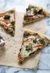 Roasted Broccoli Pesto Pizza! Roasted broccoli pesto, roasted broccoli, peppers, and fontina cheese. So, so yummy! Vegetarian | www.delishknowledge.com