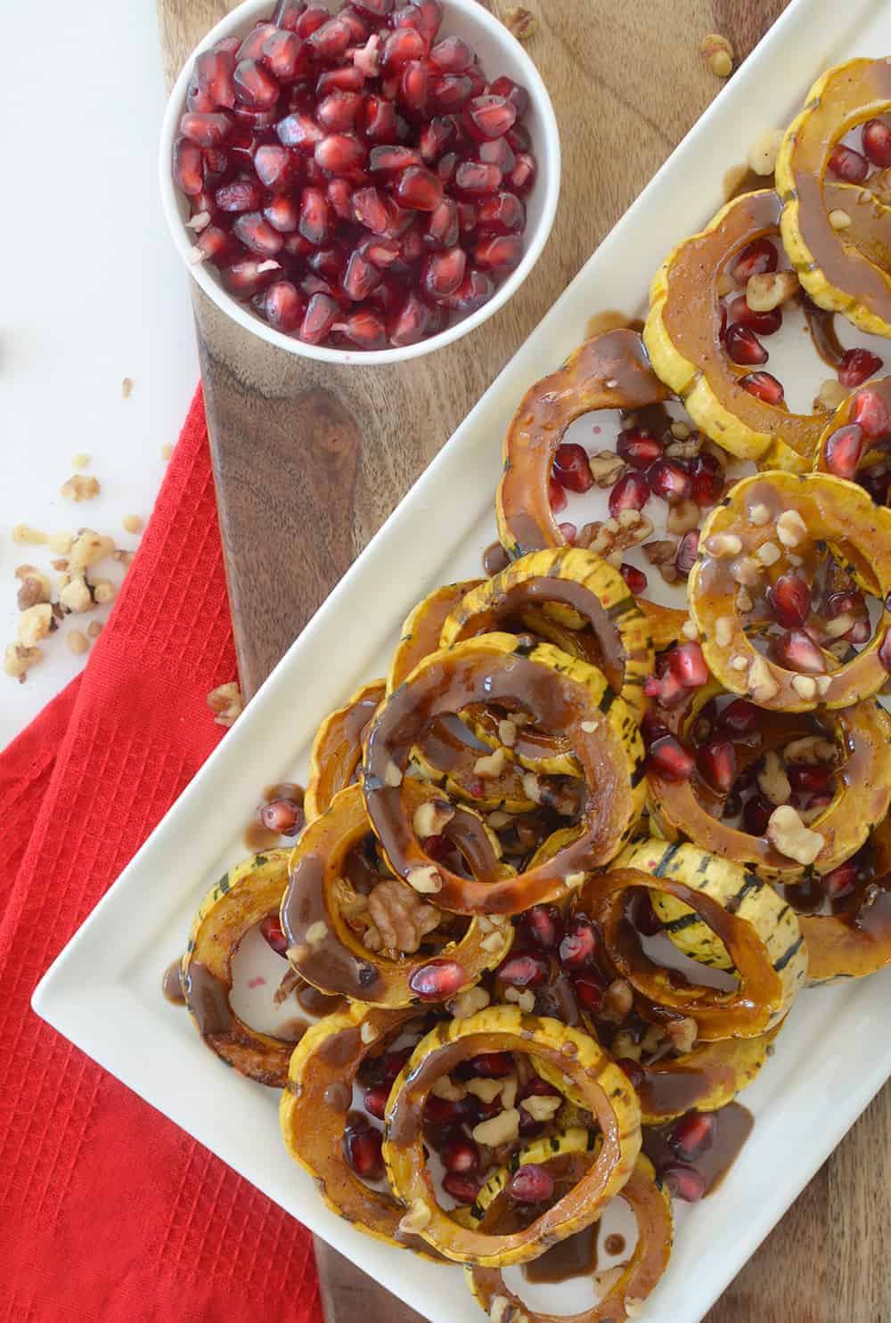 Pomegranate Roasted Delicata Squash 5 Pomegranate Roasted Delicata Squash! Caramelized Squash With A Pomegranate-Maple Dressing And Fresh Pomegranate Seeds! A Vegan And Gluten-Free Side Dish, Perfect For Thanksgiving Or The Holidays! | Www.delishknowledge.com