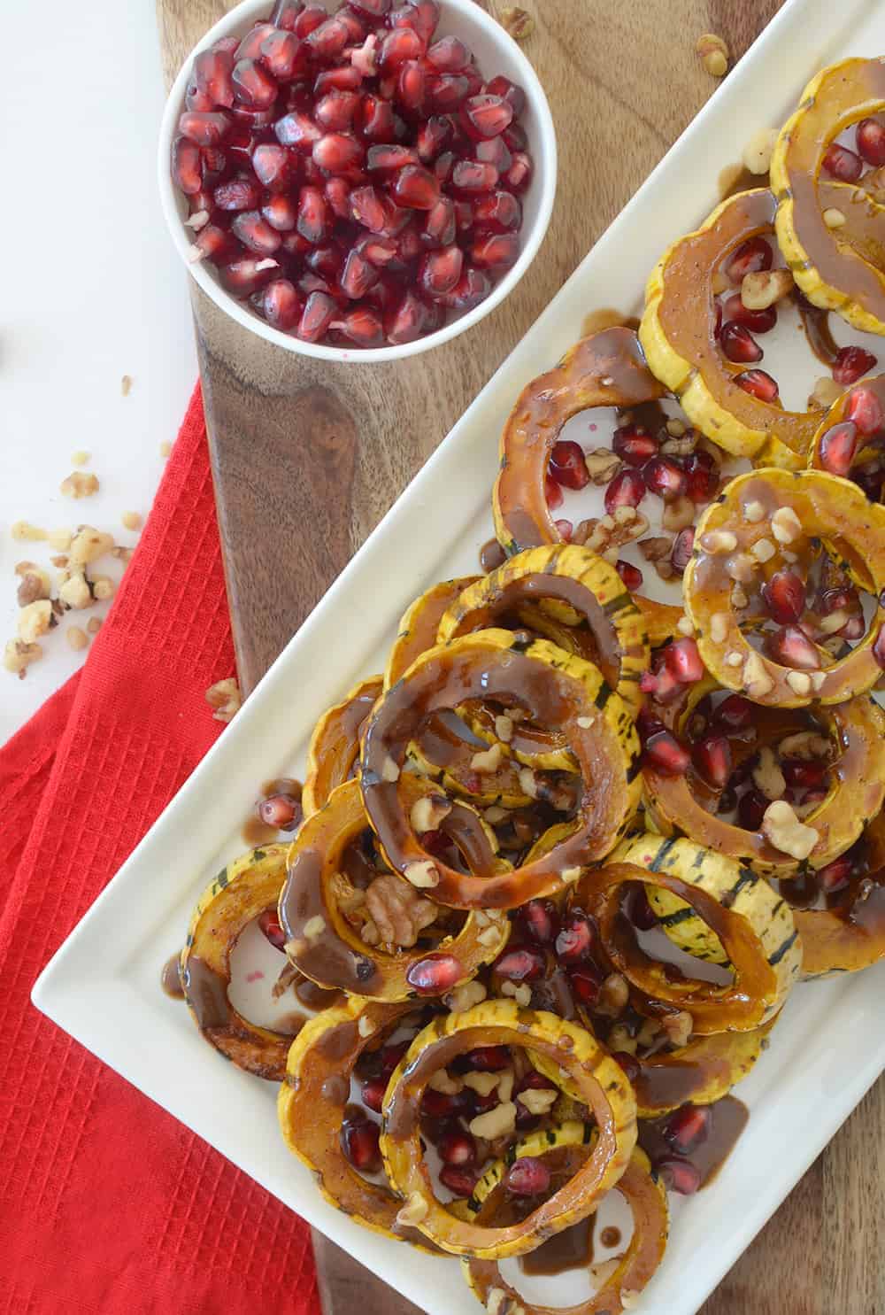 Pomegranate Roasted Delicata Squash! Caramelized Squash With A Pomegranate-Maple Dressing And Fresh Pomegranate Seeds! A Vegan And Gluten-Free Side Dish, Perfect For Thanksgiving Or The Holidays! | Www.delishknowledge.com