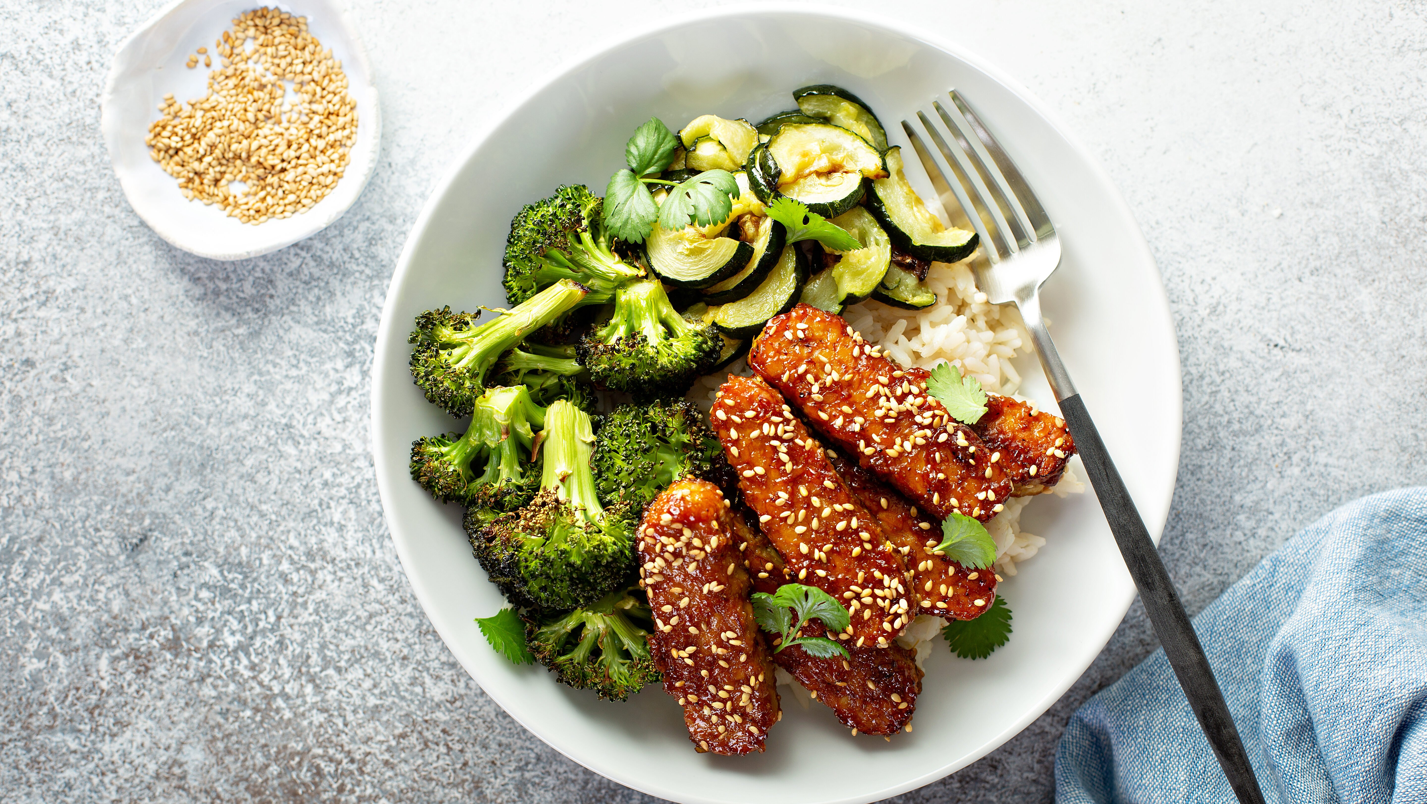 Teryaki,Tempeh,With,Rice,And,Roasted,Vegetables