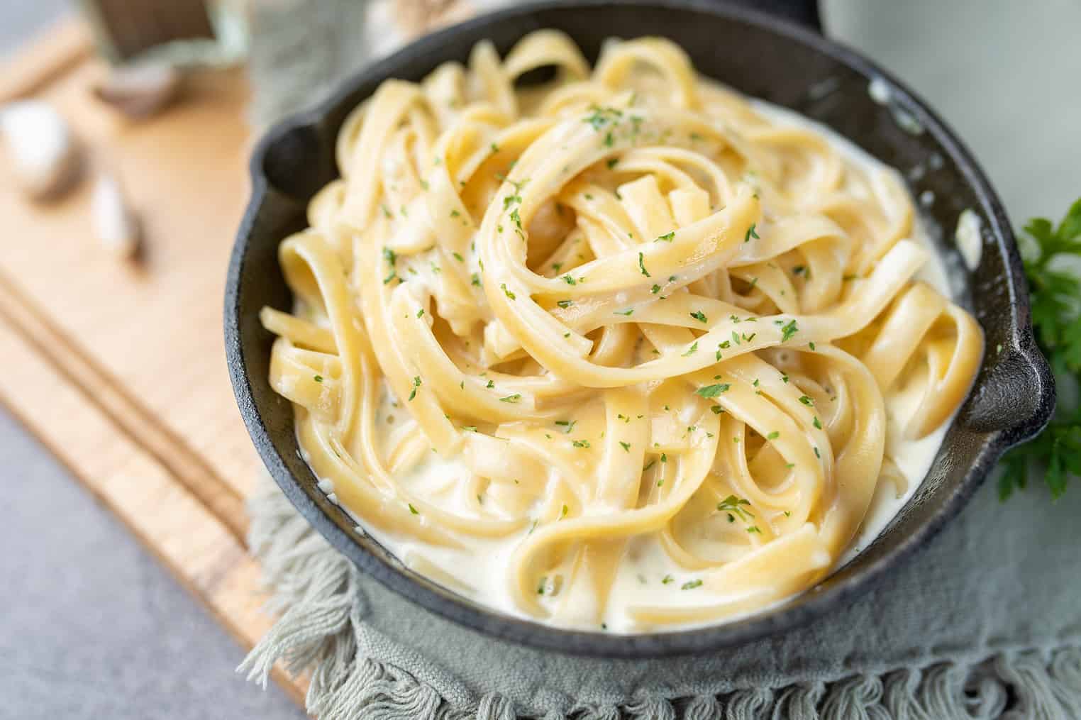 Alfredo Pasta Dinner With Creamy White Sauce And Herbs