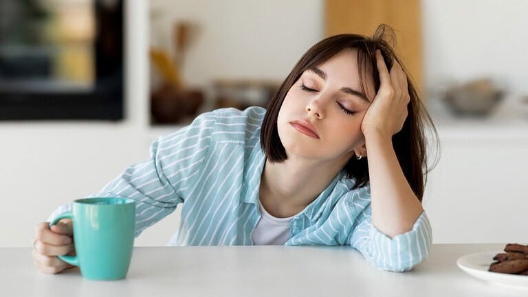 Sleepy,Young,Woman,Drinking,Coffee,,Feeling,Tired,,Suffering,From,Insomnia