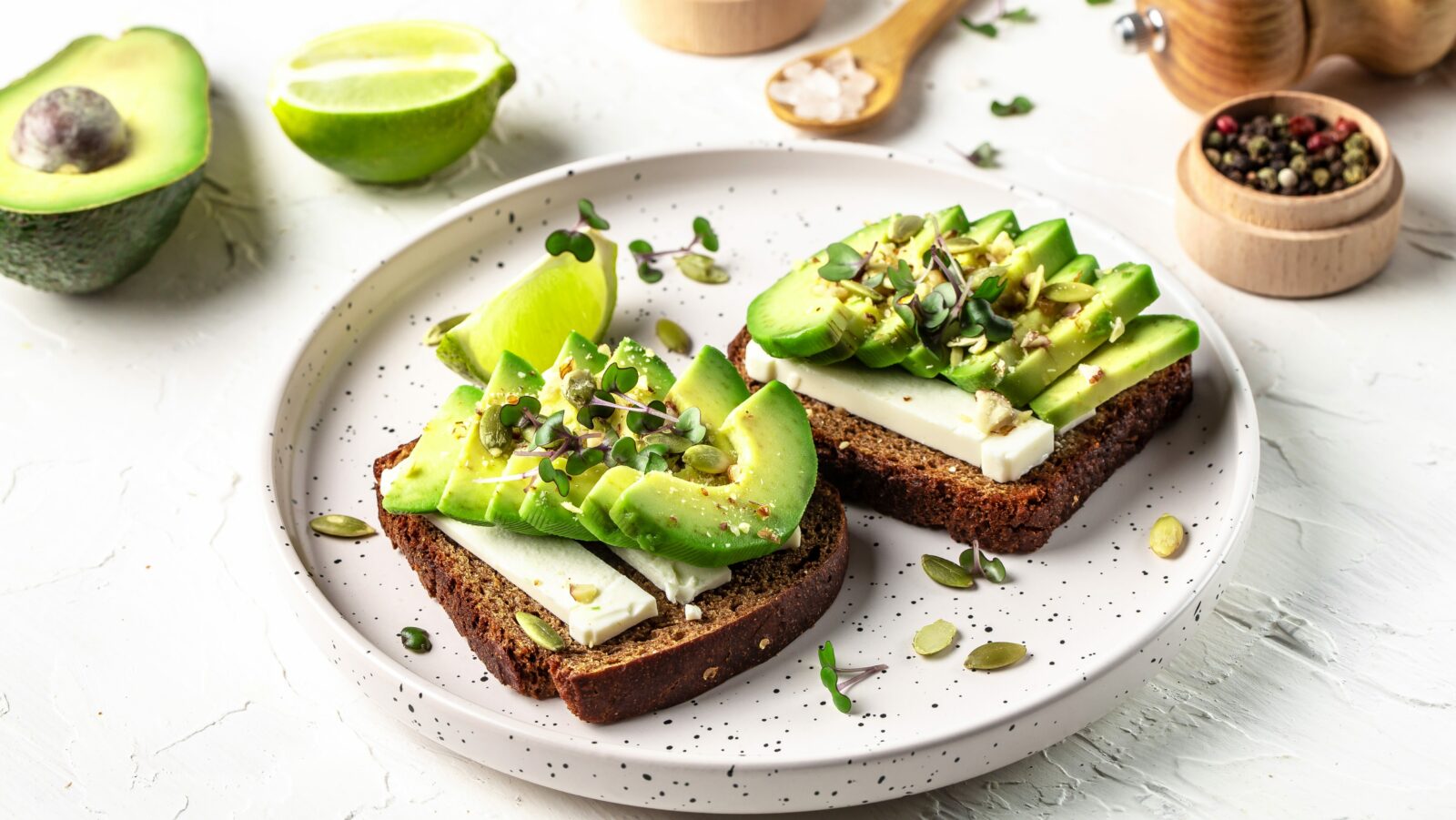 Healthy,Avocado,Toasts,With,Rye,Bread,,Sliced,Avocado,,Cheese,,Pumpkin,