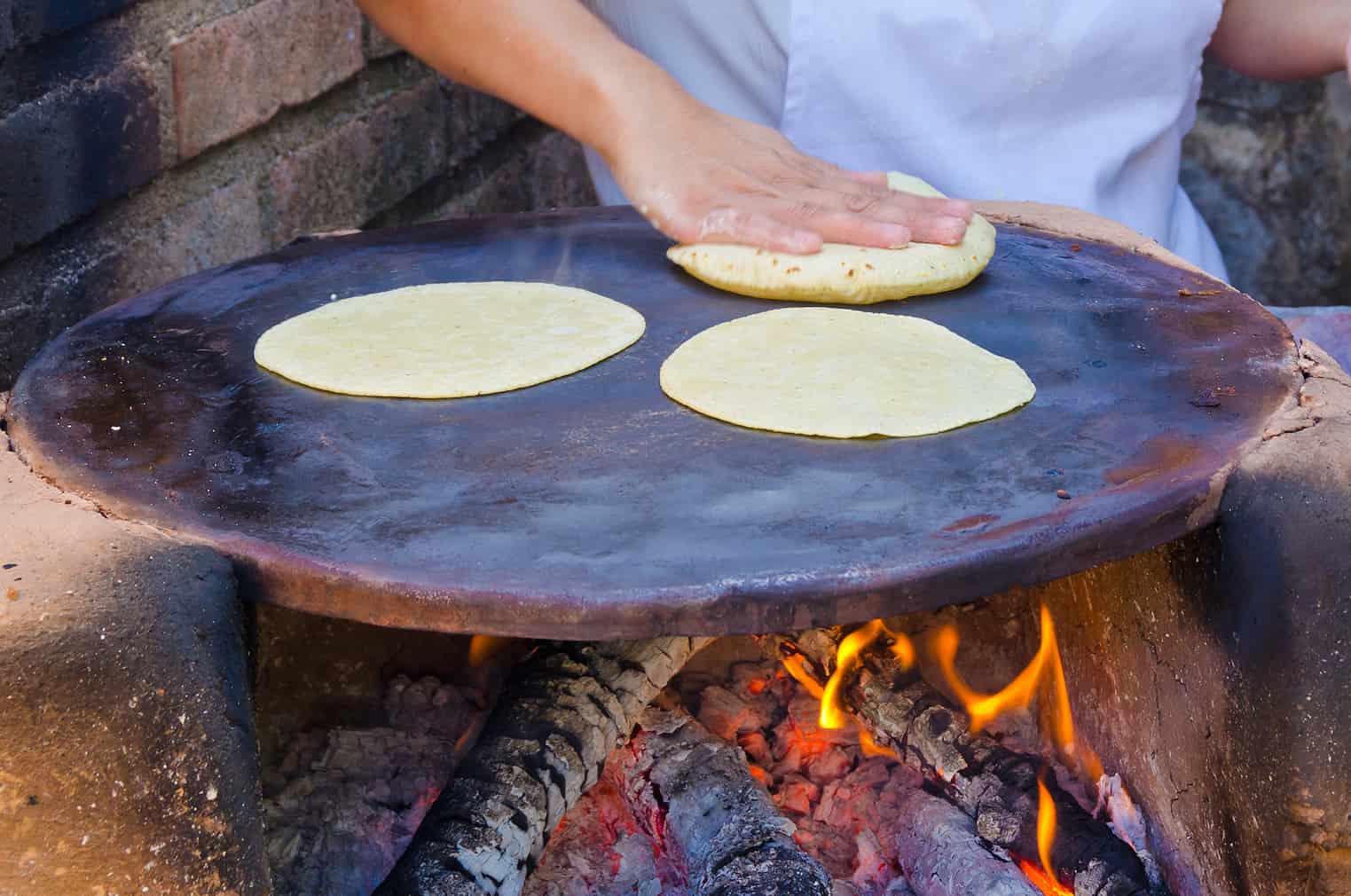 Making flour tortillas. Oven with firewood.