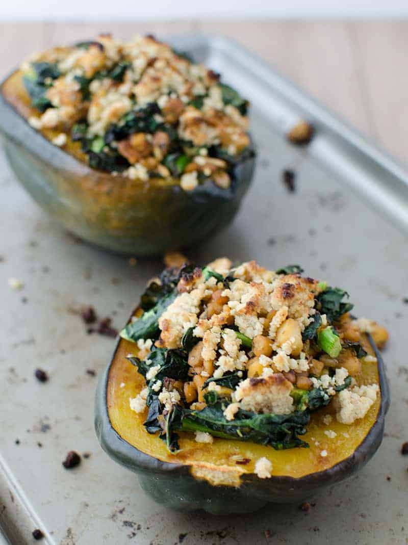 Stuffed Squash! The Perfect Centerpiece For Thanksgiving Or Christmas. Vegan And Gluten-Free. Acorn Squash Stuffed With Homemade Temeph Sausage, Kale, And Topped With A Walnut Crumble. | Www.delishknowledge.com