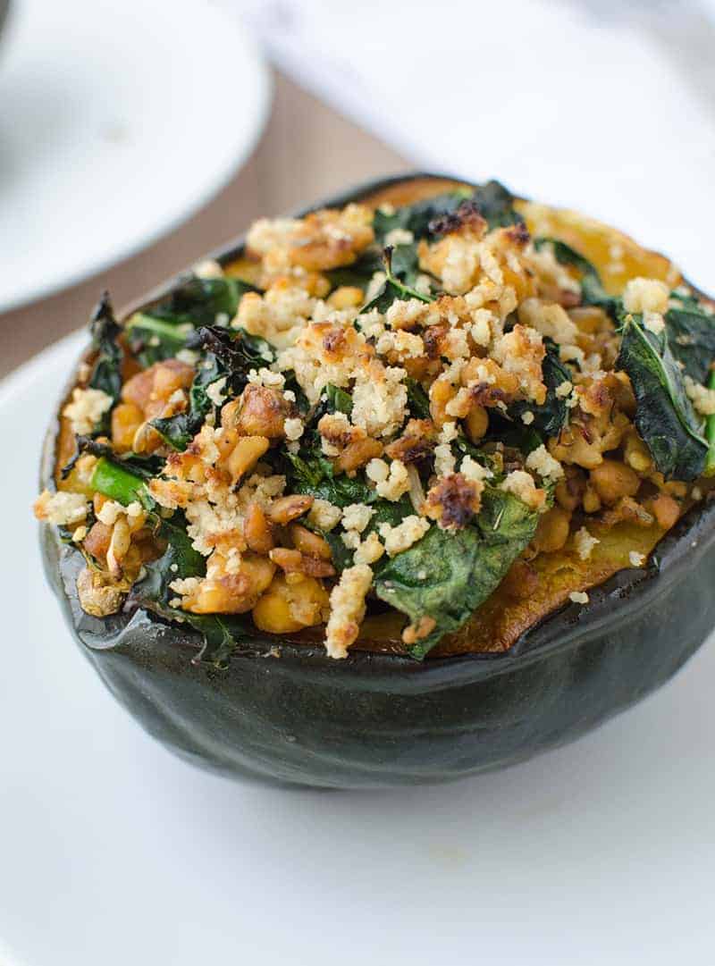 Stuffed Squash! The Perfect Centerpiece For Thanksgiving Or Christmas. Vegan And Gluten-Free. Acorn Squash Stuffed With Homemade Temeph Sausage, Kale, And Topped With A Walnut Crumble. | Www.delishknowledge.com