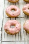 Vegan Strawberry Shortcake Donuts! Strawberry donuts with strawberry frosting! You have to try these- perfect for Spring! | www.delishknowledge.com