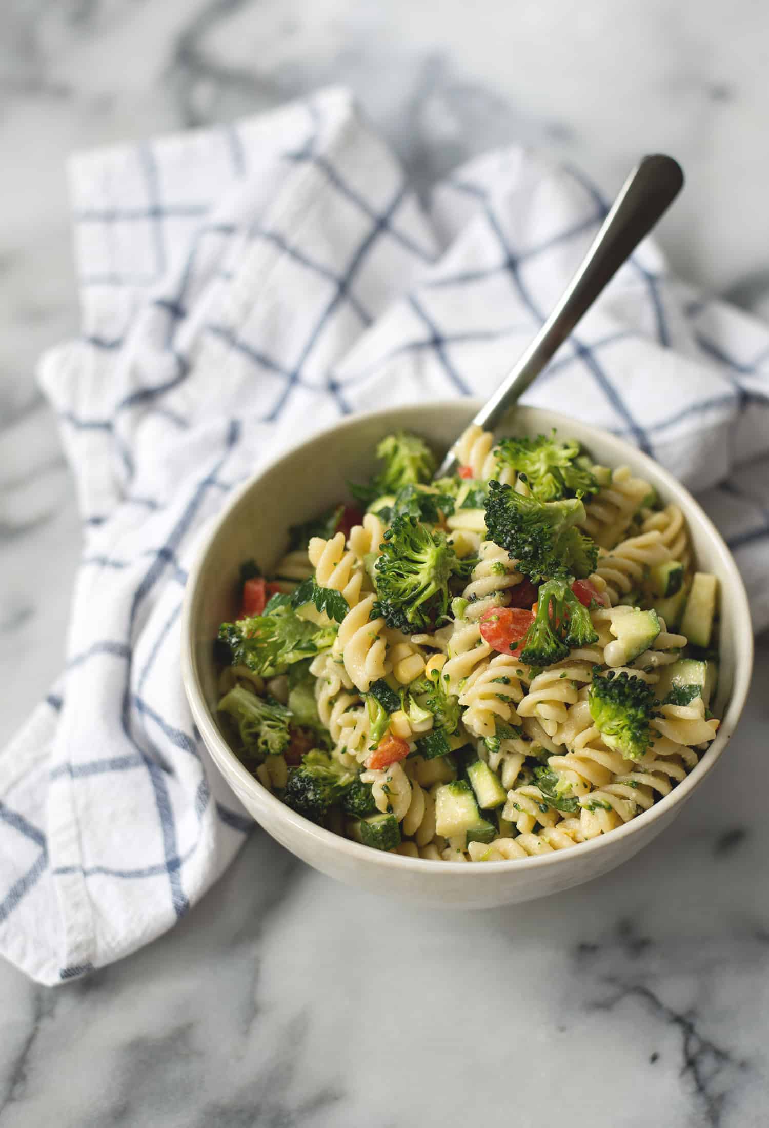 Summer Pasta Salad In A Bowl With A Cloth 