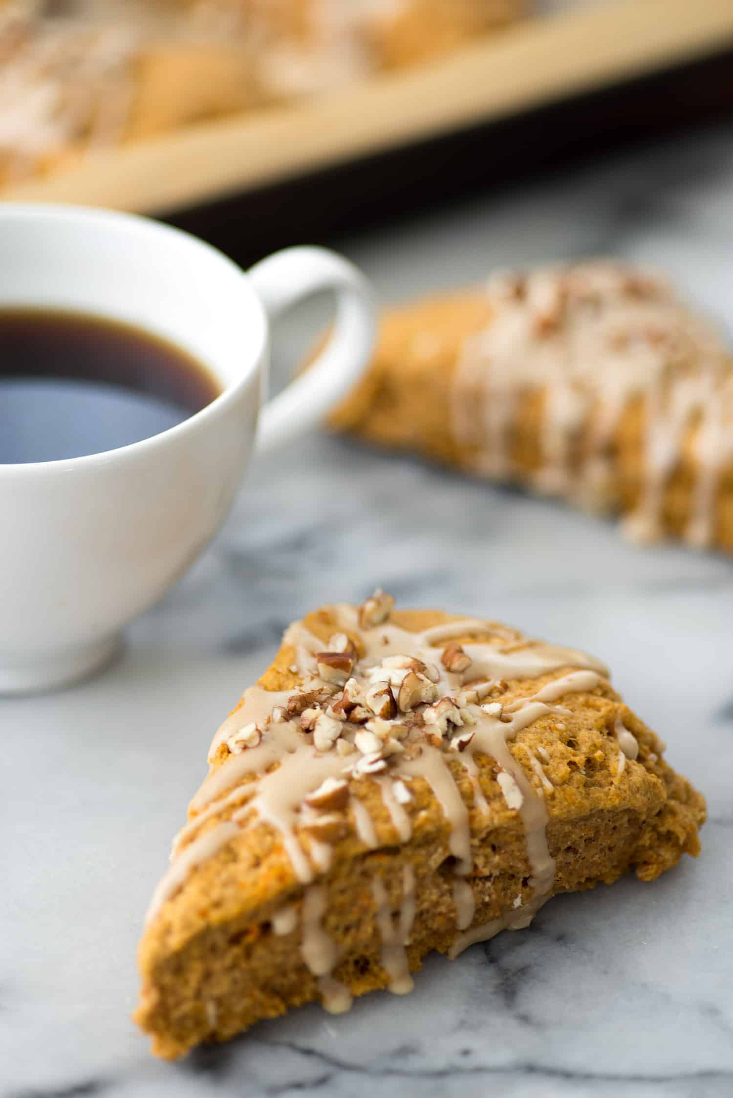 Sweet Potato Pecan Scones With Maple Frosting! You Are Going To Love These Healthy, Vegan Scones! Packed With Sweet Potato Puree, Whole Wheat-Flour And Pecans. Drizzled With Maple Frosting And Covered With More Pecans. | Www.delishknowledge.com 