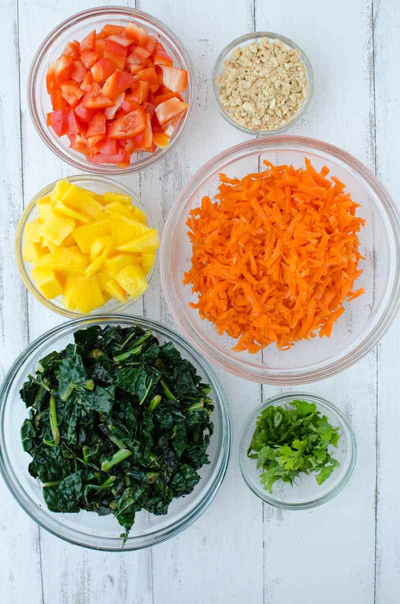 Vegan And Gluten Free Thai Curry Bowls! Layers Of Rice, Mango, Kale, Carrots, Peppers And The Best Red Curry Thai Sauce! | Www.delishknowledge.com