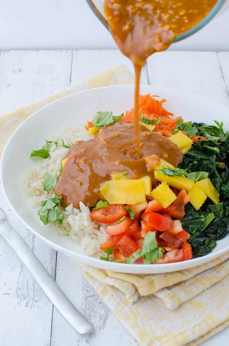 Vegan And Gluten Free Thai Curry Bowls! Layers Of Rice, Mango, Kale, Carrots, Peppers And The Best Red Curry Thai Sauce! | Www.delishknowledge.com