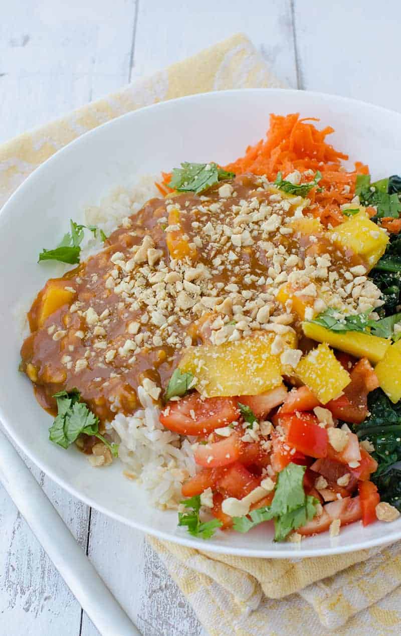 Vegan And Gluten Free Thai Curry Bowls! Layers Of Rice, Mango, Kale, Carrots, Peppers And The Best Red Curry Thai Sauce! | Www.delishknowledge.com