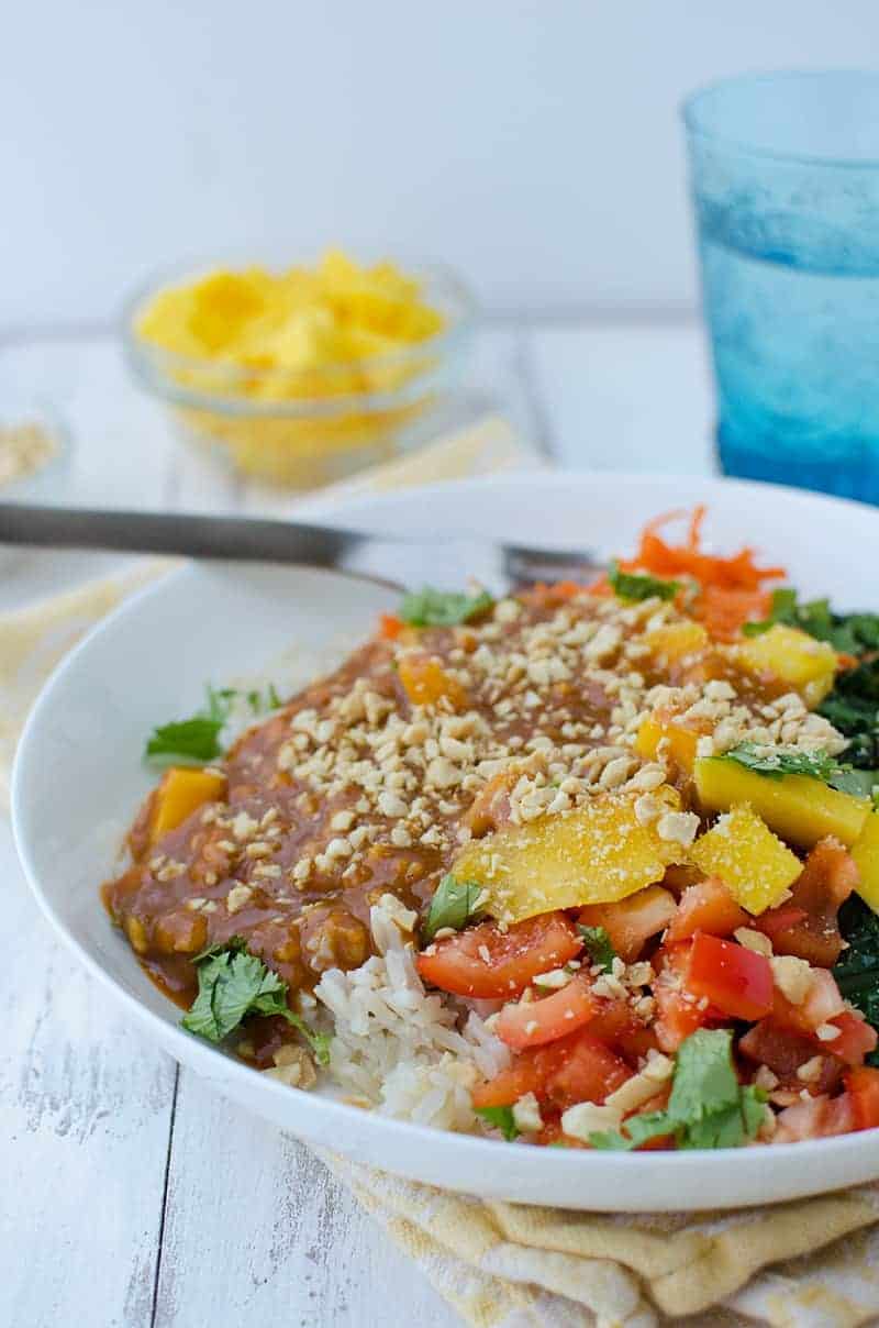 Vegan And Gluten Free Thai Curry Bowls! Layers Of Rice, Mango, Kale, Carrots, Peppers And The Best Red Curry Thai Sauce! | Www.delishknowledge.com