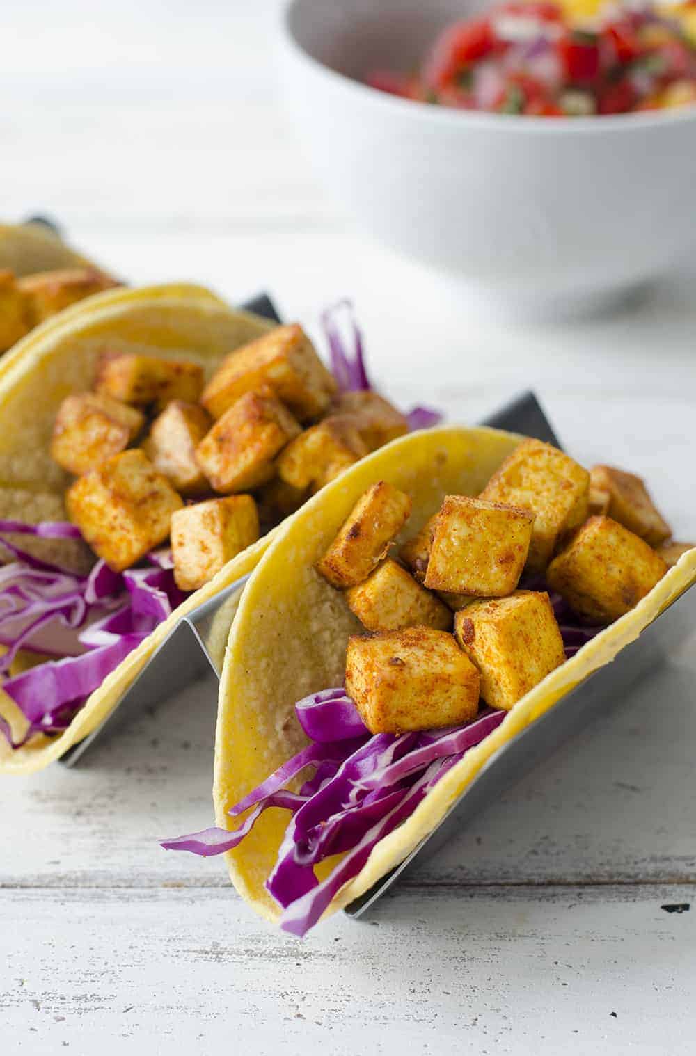 Tropical Tofu Tacos With Mango Salsa! Jerk Seasoned Tofu With Quick Mango Salsa, Shredded Cabbage And Sliced Avocado. | Www.delishknowledge.com