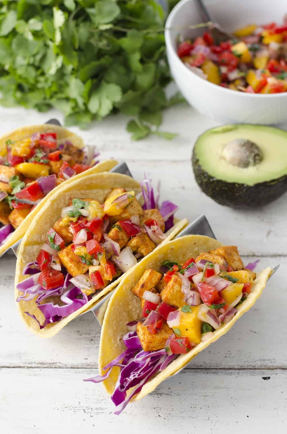 Tropical Tofu Tacos With Mango Salsa! Jerk Seasoned Tofu With Quick Mango Salsa, Shredded Cabbage And Sliced Avocado. | Www.delishknowledge.com