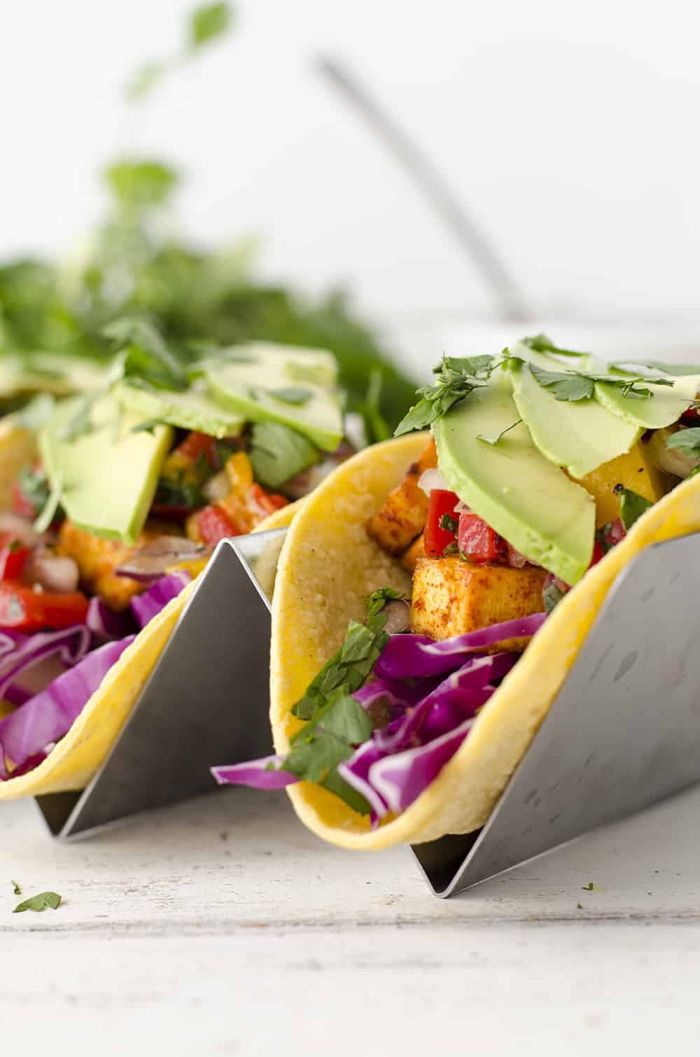 Tropical Tofu Tacos With Mango Salsa! Jerk Seasoned Tofu With Quick Mango Salsa, Shredded Cabbage And Sliced Avocado. | Www.delishknowledge.com