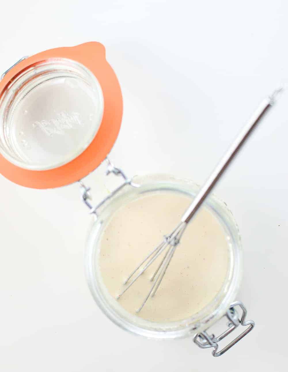 Creamy Goddess Dressing Being Whisked Together 