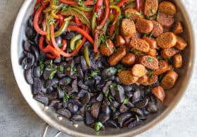 skillet with potatoes, sausage and peppers