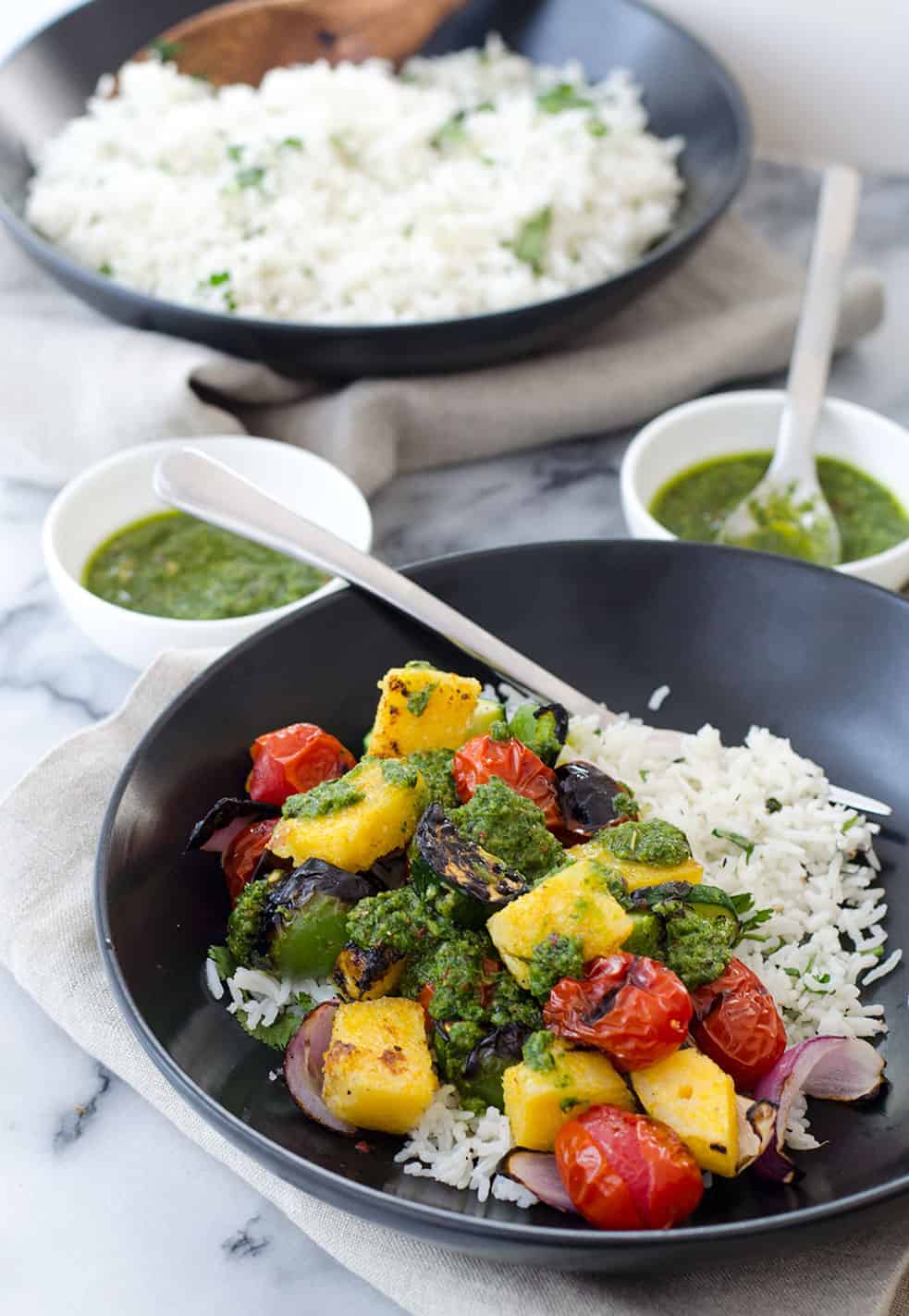 Vegan Polenta Kebobs With Chimichurri Sauce! Perfect For Cookouts This Summer! Served With Herbed Rice, This Vegan And Glutenfree Dish Is A Must Make. | Delishknowledge.com