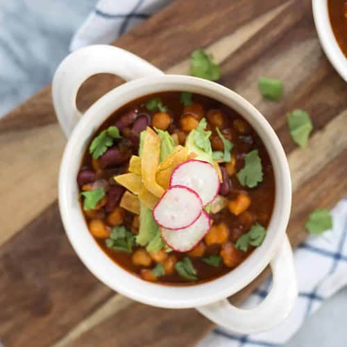 Vegan Pozole! Hearty, Protein-Rich Soup Made With Hominy, Peppers And Beans. Vegan And Gluten-Free | Www.delishknowledge.com