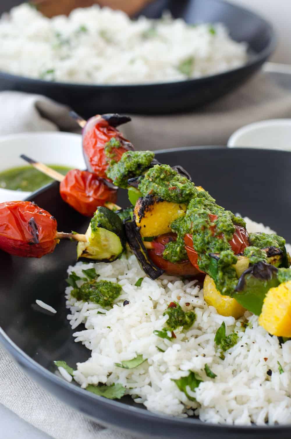 Vegan Polenta Kebobs With Chimichurri Sauce! Perfect For Cookouts This Summer! Served With Herbed Rice, This Vegan And Glutenfree Dish Is A Must Make. | Delishknowledge.com